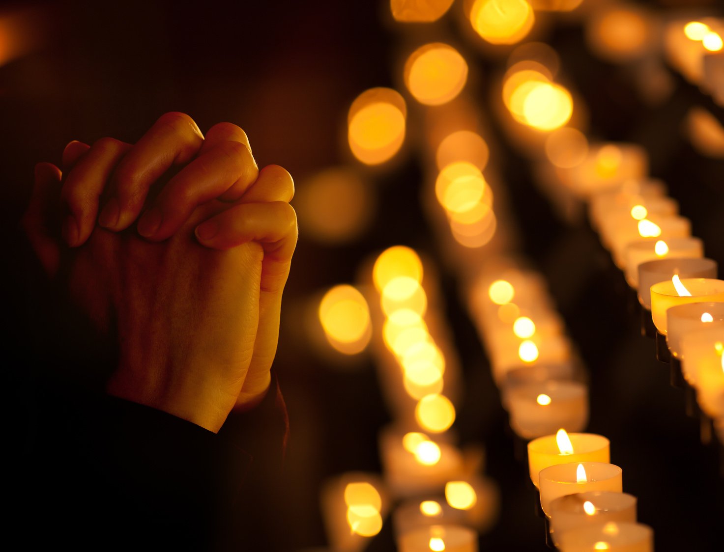 Praying in catholic church. Religion concept